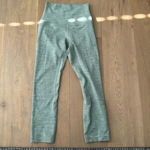 Teal/Turquoise Lululemon pants.